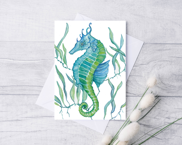 Green seahorse in seagrass watercolor greeting card